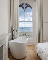 Presidential Apartment | Premium bedding, down comforters, individually decorated