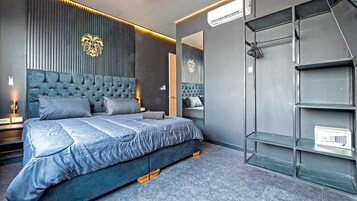 Premium bedding, down duvets, memory-foam beds, in-room safe