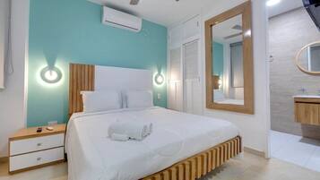 Premium bedding, down duvets, memory-foam beds, in-room safe