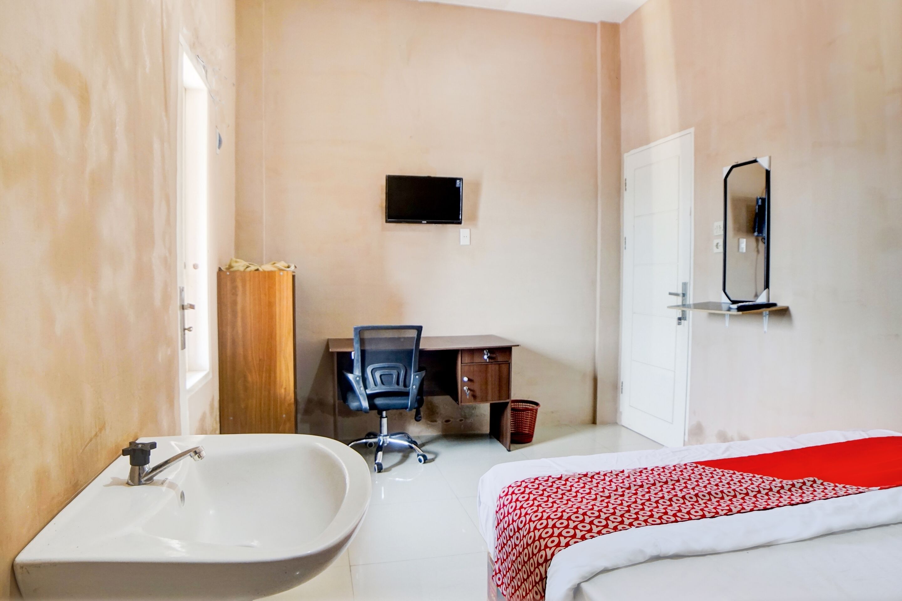 Photo - Hotel O Penginapan Syariah Faster Inn