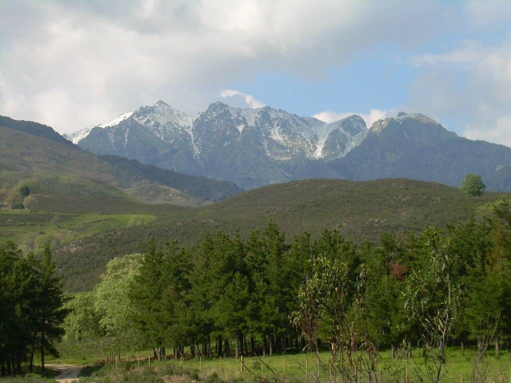 A mountainous landscape with a clear sky.