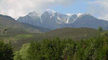 A mountainous landscape with a clear sky.