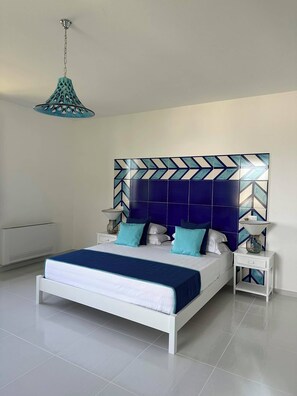 Suite Deluxe, salle de bains attenante, vue mer (Blu) | Draps en coton égyptien, literie de qualité supérieure