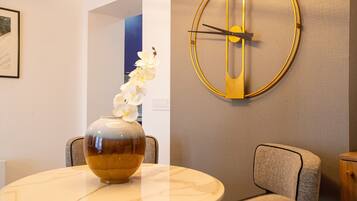 Luxury Apartment | Living area | 55-inch Smart TV with cable channels