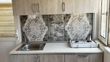 Luxury Studio Suite | 1 bedroom, free WiFi, bed sheets