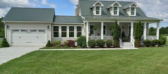 Gorgeous countryside farmhouse on 10 acres. Carriage house also available. 