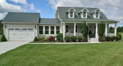 Gorgeous countryside farmhouse on 10 acres. Carriage house also available.