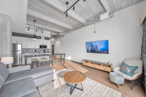 Premium Quadruple Room, 4 Bedrooms | Living room | 55-inch Smart TV with digital channels