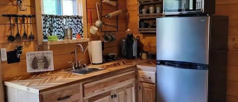 Microwave, coffee/tea maker, toaster, paper towels