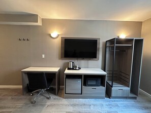 Premium bedding, down duvets, desk, laptop workspace