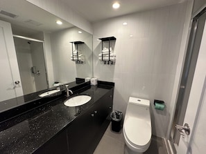 Hair dryer, towels, soap, shampoo