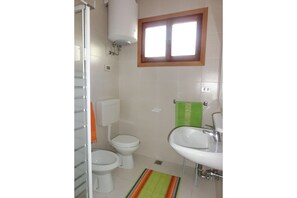 Apartamento, 3 quartos, vista para o jardim | Banheiro