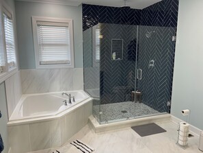 Shower, eco-friendly toiletries, hair dryer, towels