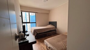 2 habitaciones, tabla de planchar con plancha, wifi y ropa de cama 
