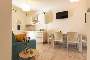 Appartement, 1 chambre, patio, vue jardin | Salle à manger