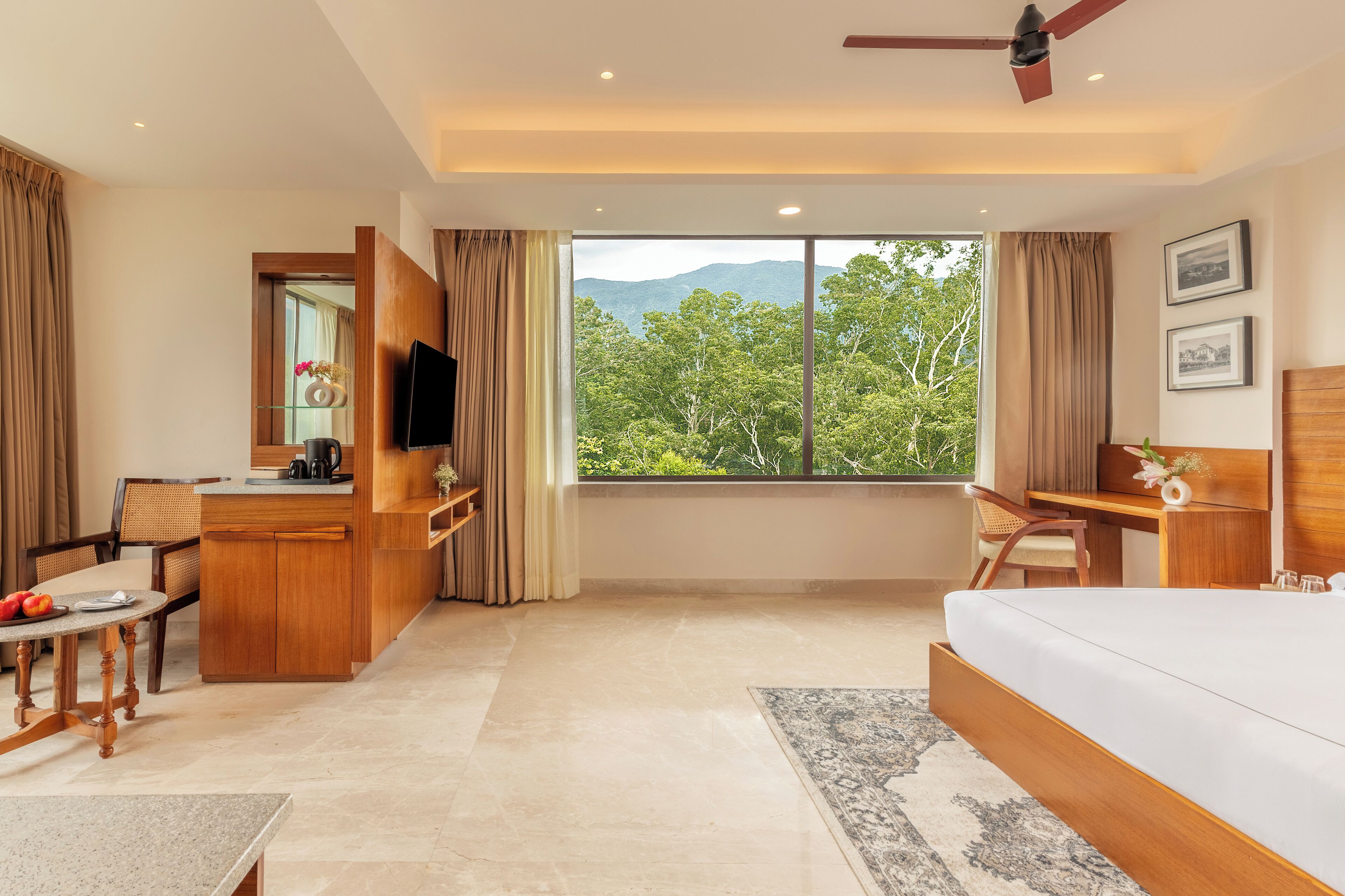 Junior Suite with Jungle View | Minibar, in-room safe, desk, laptop workspace