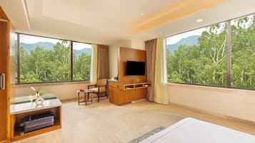 Junior Suite with Jungle View | Minibar, in-room safe, desk, laptop workspace