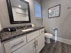 Bathtub, hair dryer, towels