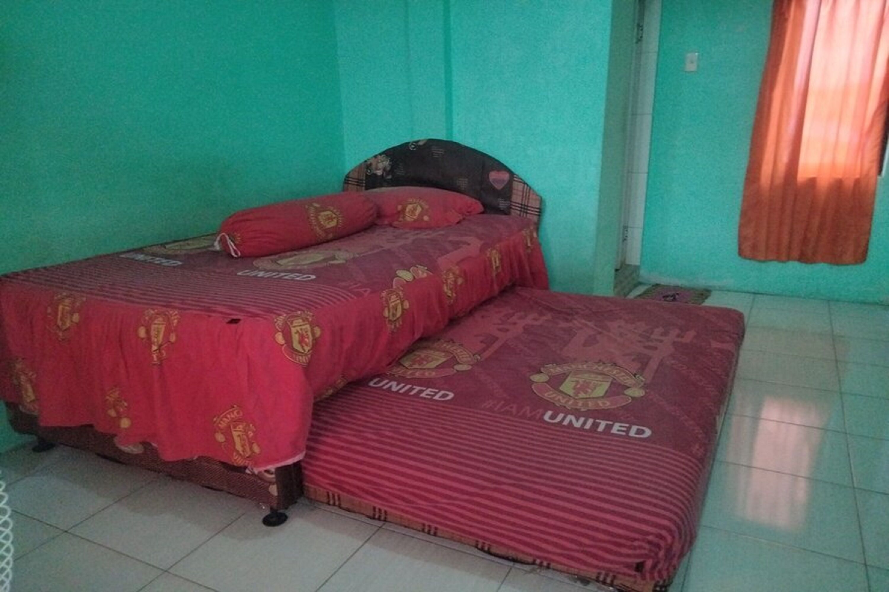 Photo - Hotel O Nany Asoka Syariah Near Anyong Cafe Studio