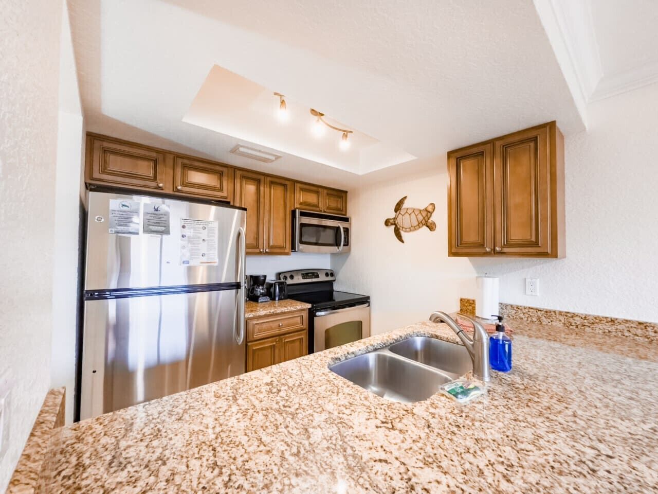 Microwave, oven, coffee/tea maker, cookware/dishes/utensils