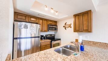 Microwave, oven, coffee/tea maker, cookware/dishes/utensils