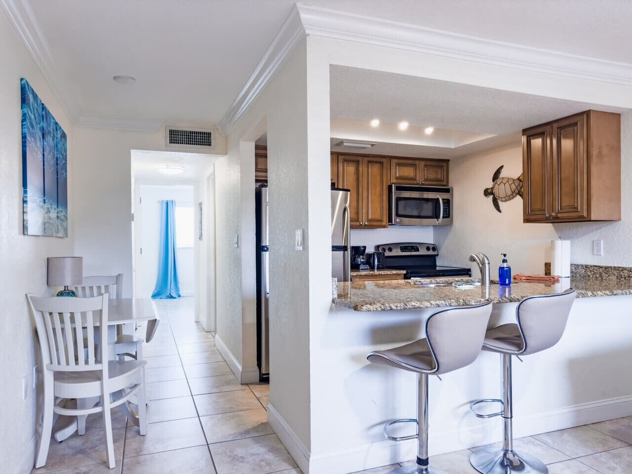 Microwave, oven, coffee/tea maker, cookware/dishes/utensils