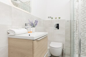 Douche, serviettes fournies