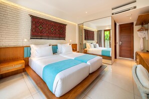 Habitación Deluxe con 1 cama matrimonial o 2 individuales | Ropa de cama de alta calidad y caja de seguridad en la habitación 