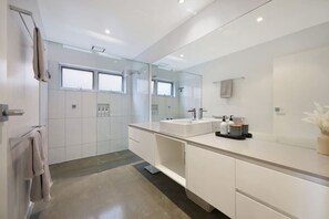 Bathtub, hair dryer, towels