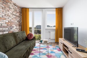 Apartamento, 1 habitación, 2 baños | Zona de estar