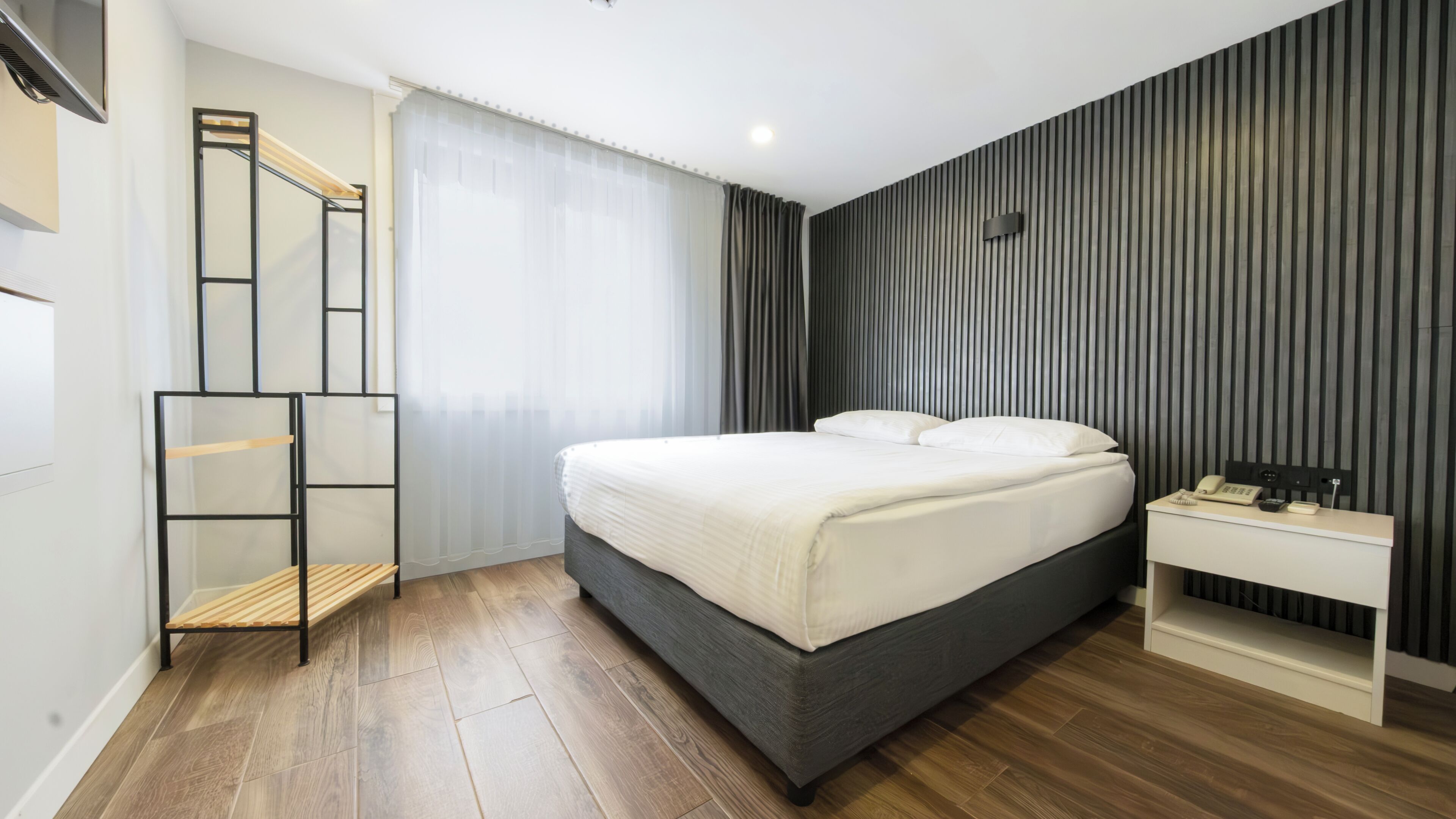 Premium-sengetøj, minibar, mørklægningsgardiner, lydisolering