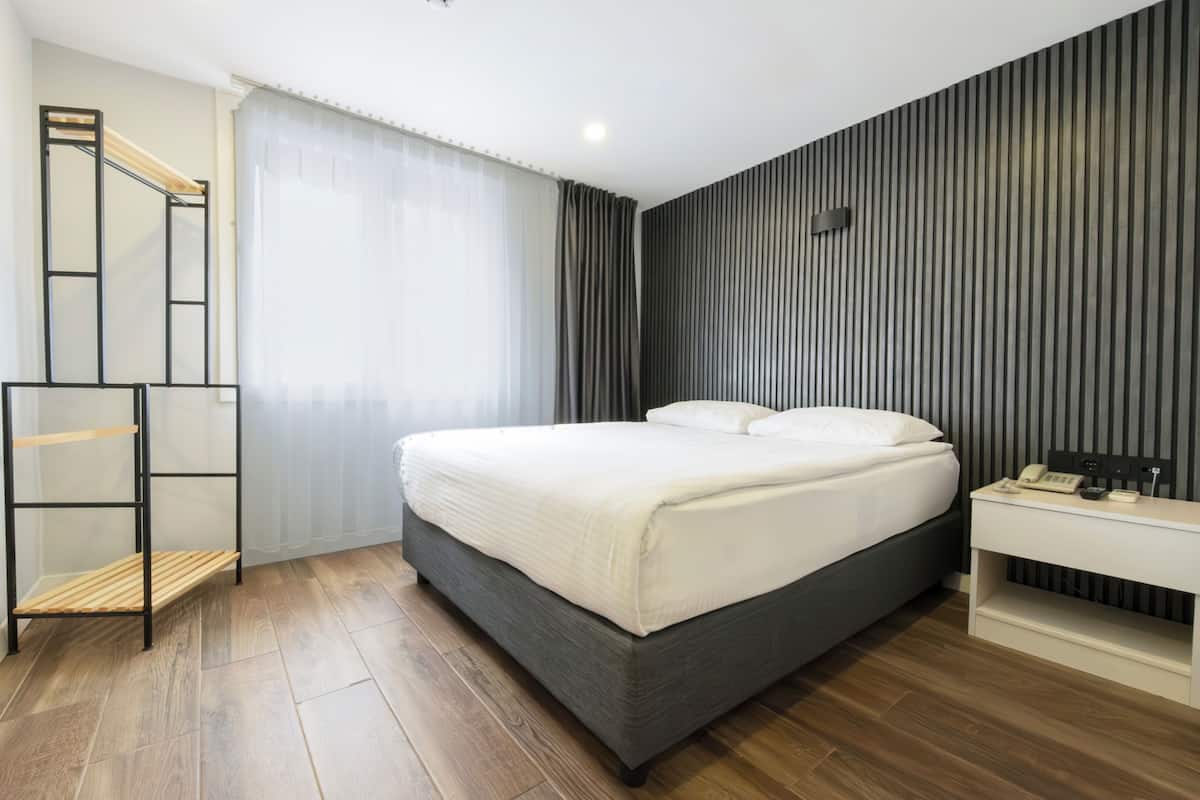Bộ đồ giường cao cấp, minibar, màn/rèm cản sáng, phòng cách âm