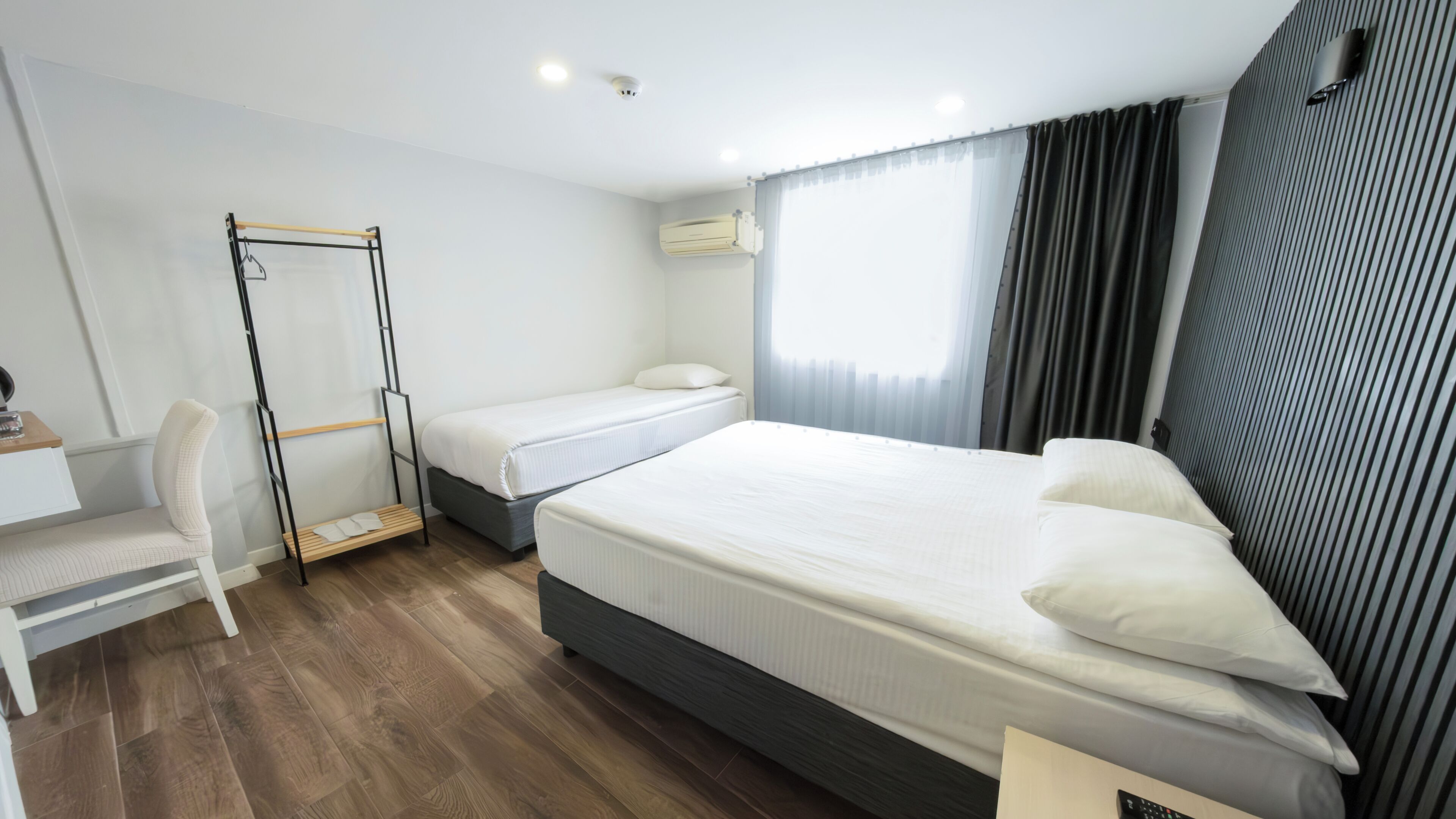 Basic-værelse til 3 personer | Premium-sengetøj, minibar, mørklægningsgardiner, lydisolering