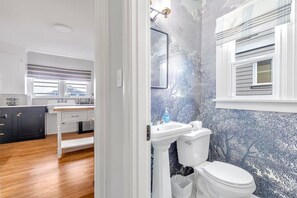 Bathtub, hair dryer, towels