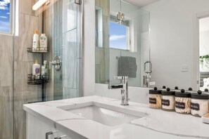 Bathtub, hair dryer, towels