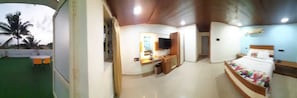 Laptop workspace, blackout curtains, iron/ironing board, rollaway beds