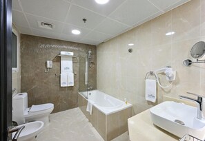 Jetted bath, rainfall showerhead, free toiletries, hair dryer