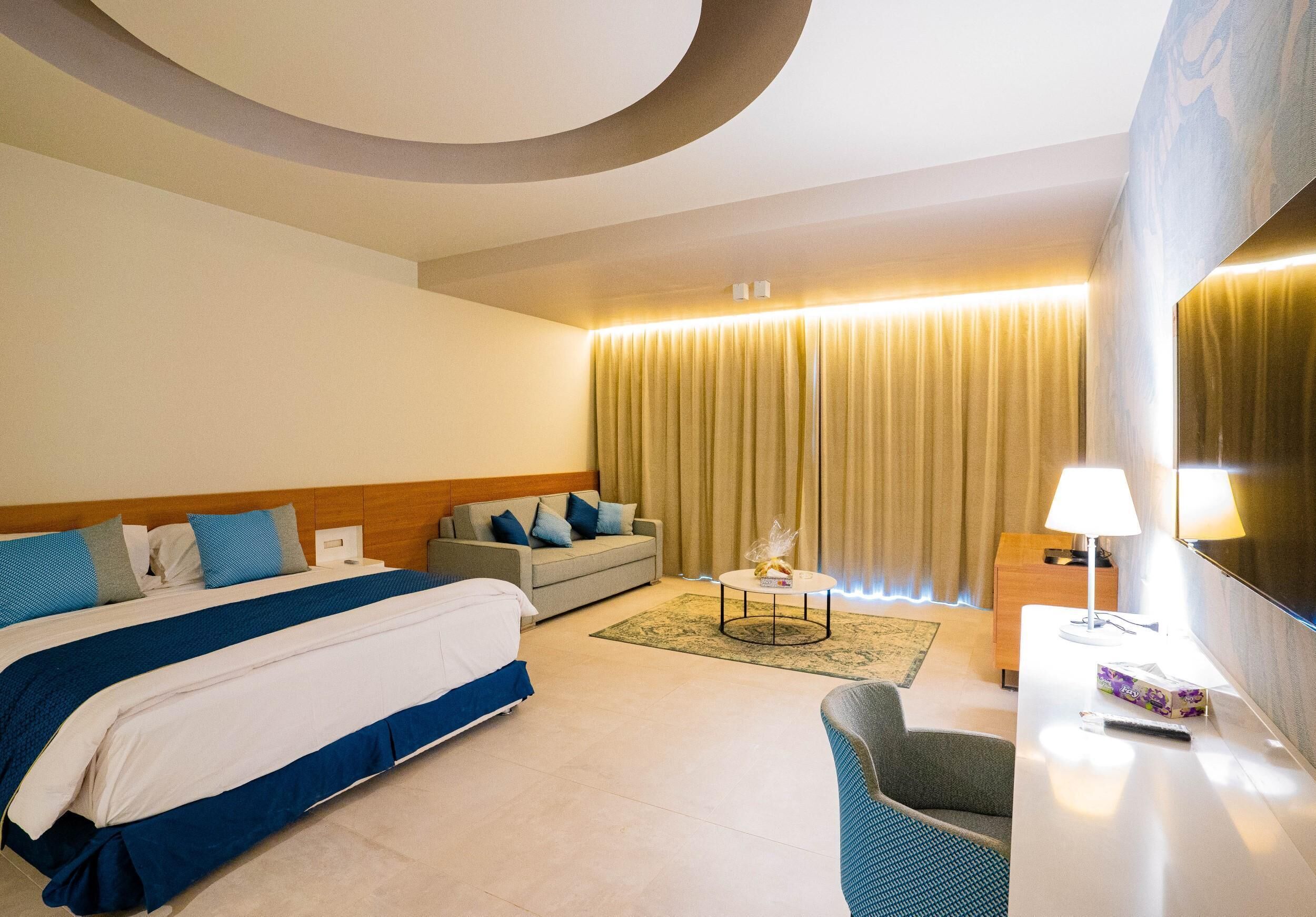 Quarto luxo | Frigobar, Wi-Fi de cortesia, roupa de cama