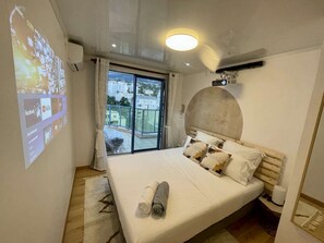 2 slaapkamers, een strijkplank/strijkijzer, reisbedje, wifi