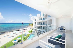 Outdoor dining - Rum Point Resort 303: Stay Longer for Less! (Seven Mile Beach)