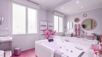 Jetted bath, hair dryer, towels, soap