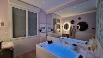 Jetted tub, hair dryer, towels, soap