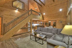 Televisión, chimenea, reproductor de DVD, mesa de ping pong