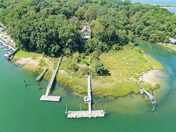 A breathtaking bird's-eye view of Nature's Paradise, complete with a stretching private dock