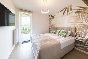 1 slaapkamer, een strijkplank/strijkijzer, reisbedje, gratis wifi