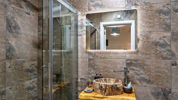 Bathtub, hair dryer, towels, soap
