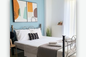 1 dormitorio, tabla de planchar con plancha, wifi gratis y ropa de cama