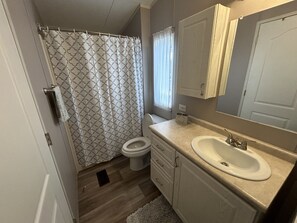 Hair dryer, towels, soap, shampoo