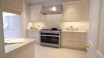 House, Multiple Beds | Private kitchen