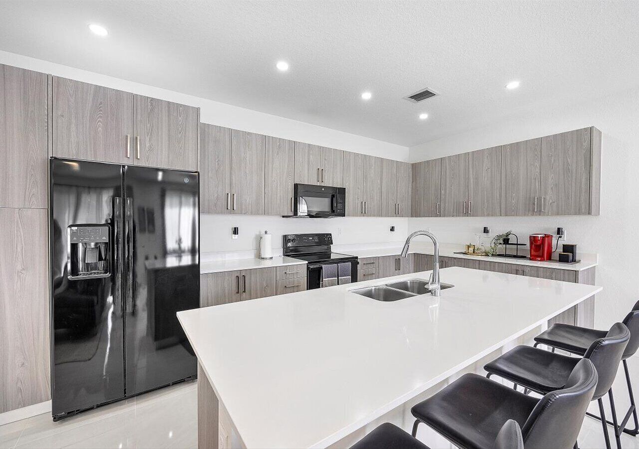 Microwave, stovetop, coffee/tea maker, electric kettle